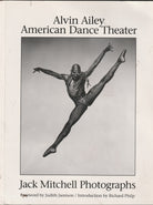 Book cover featuring a dancer in mid-air with 'Alvin Ailey American Dance Theater' and 'Jack Mitchell Photographs' text.